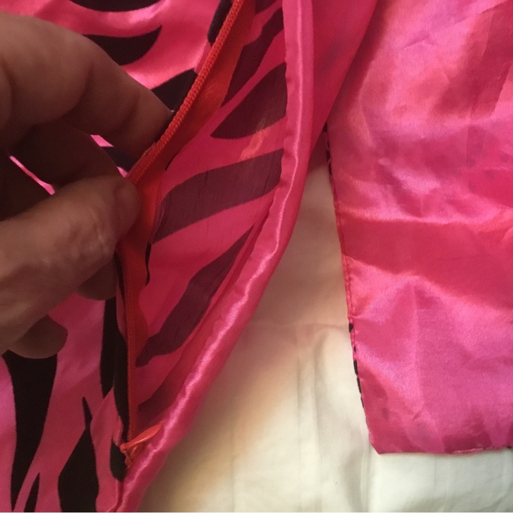 Two pink/patterned couch pillow cases. - Picture 4 of 4